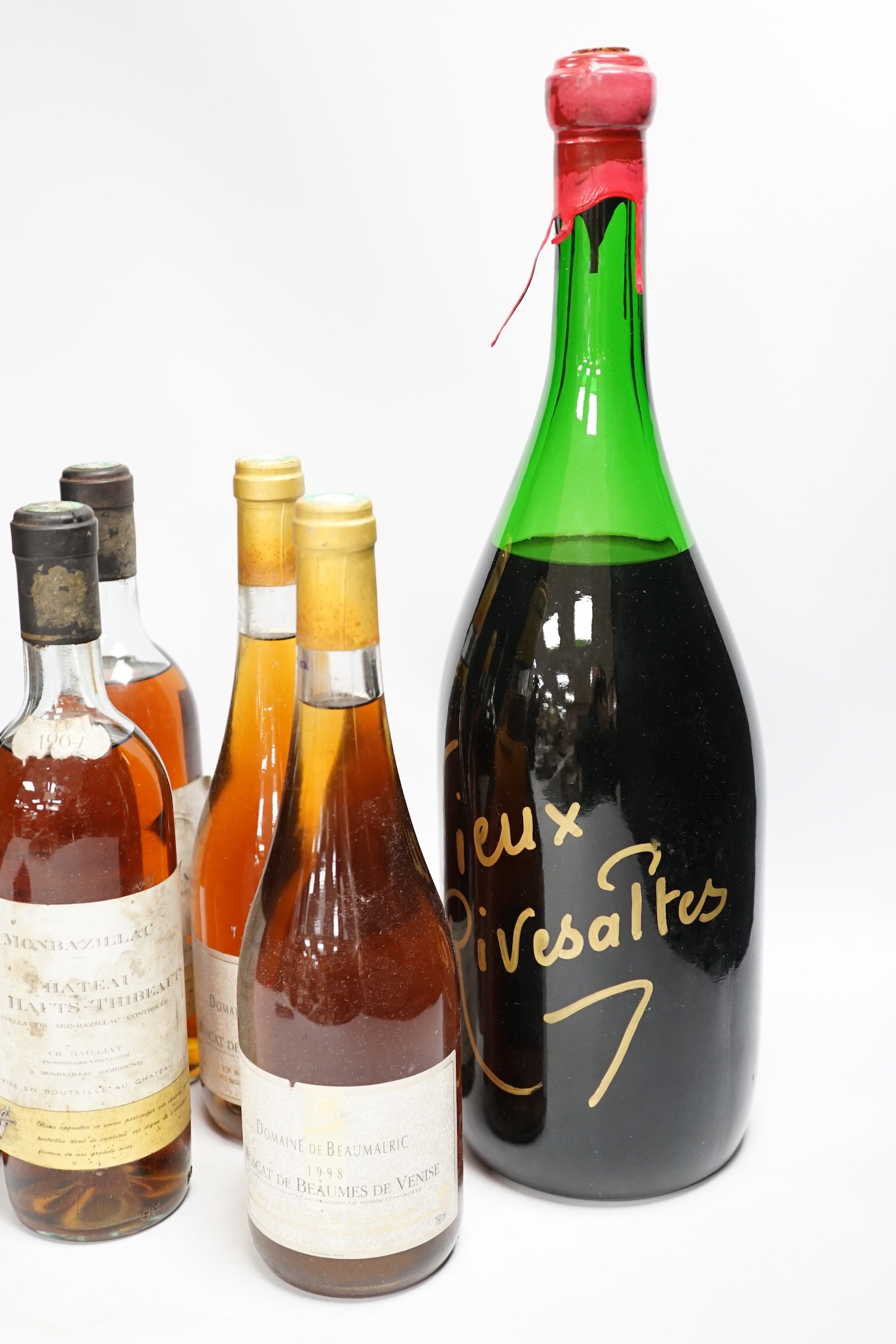 Five bottles of dessert wine including Domaine De Beaumalric 1998 and a magnum